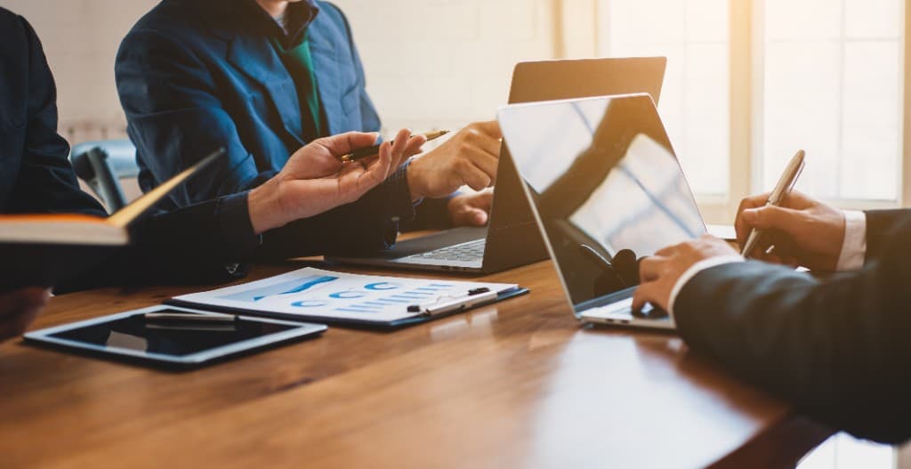 ERP consultants collaborating with a client team
